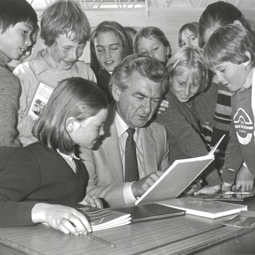 Image: Bob Hawke reading to children at the Red Hill Primary School, Canberra, 28 April 1982. Image courtesy of the NAA: A6180 [RH148/F22/1]